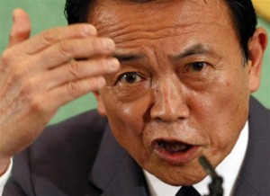 Japanese Prime Minister Taro Aso speaks during a news conference in Tokyo